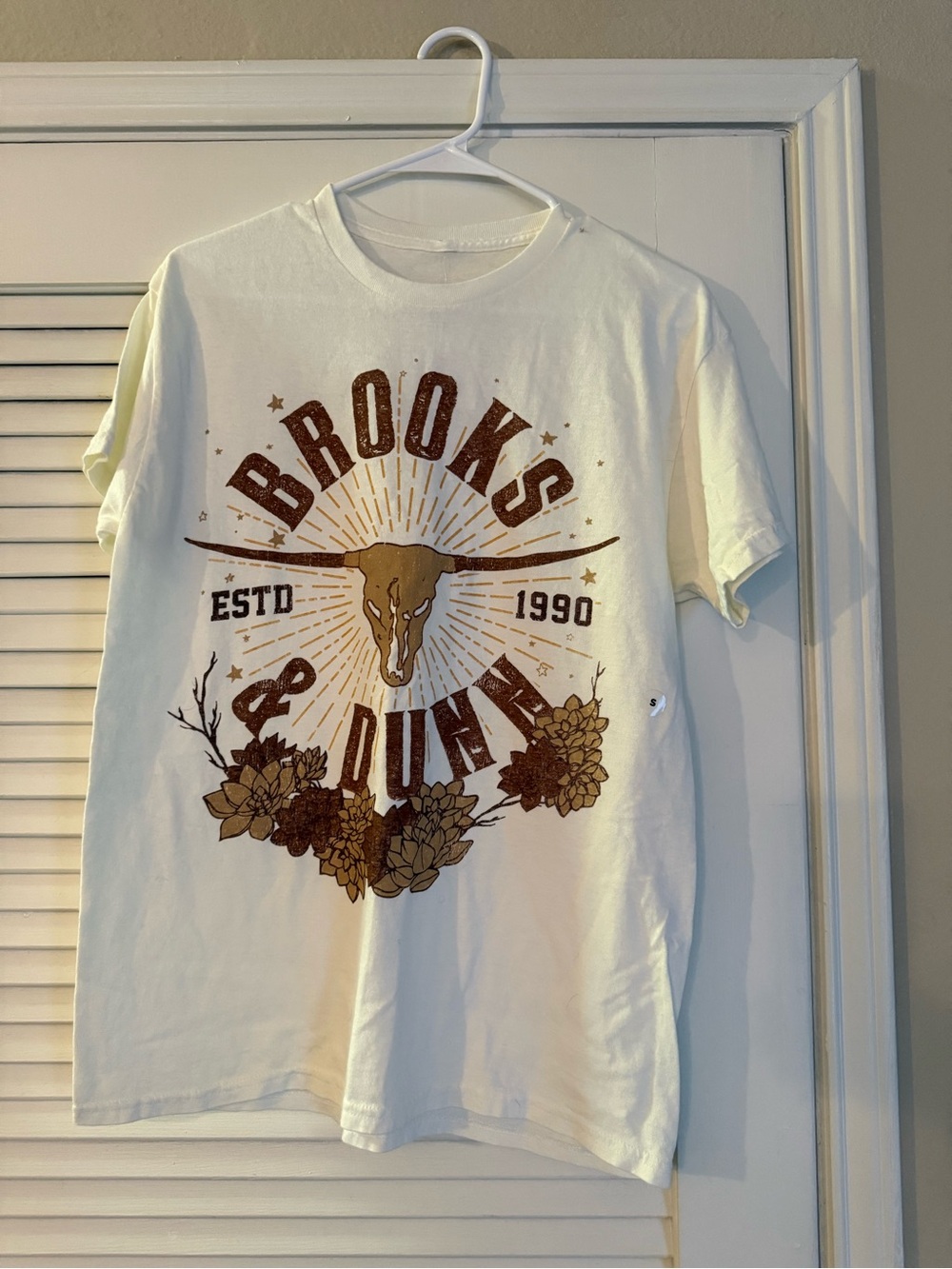 Tilly's White Graphic Tee with Brown & Gold Bull Skull Print